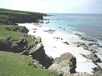 Long Sand, situated on the western side of the island, facing Rapness Sound