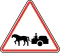 127 Animal-drawn vehicles crossing