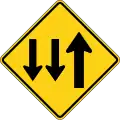 W6-5 Two-way traffic (3-Lane, two lanes in the opposing direction)