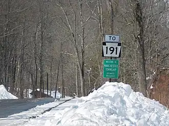 Signage off the Little Equinunk Bridge for Manchester Township and Route 191.