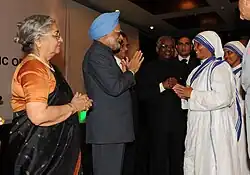 The Prime Minister, Dr. Manmohan Singh meeting the nuns from missionaries of charity at a reception for Indian community hosted by the Indian High Commissioner, in Dar es Salaam, Tanzania on 26 May 2011. Smt. Gursharan Kaur, the Union Minister for External Affairs, Shri S.M. Krishna and the Indian High Commissioner, Shri K.V. Bhagirath is also seen.