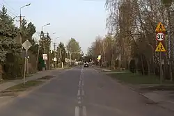 The main street of Dziekanów Leśny, ul. Marii Konopnickiej