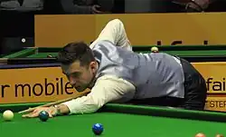 Mark Selby playing a shot