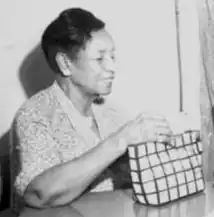 A photograph of Maude Williams taken at a state NAACP meeting in Dallas, Texas, June 1954