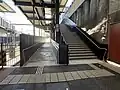 The ramps and stairs leading up to the concourse from Platform 3, December 2024