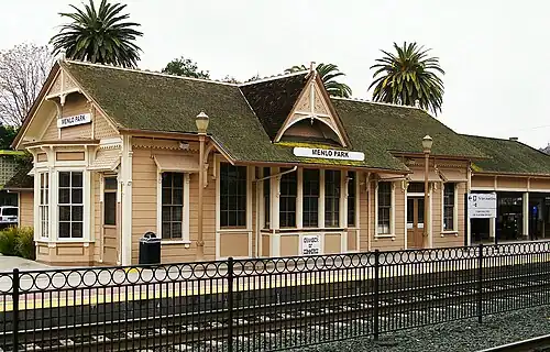 A pink railroad station building