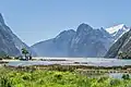 View from head of Milford Sound of some of the Darran Mountains on the north side of sound being The Lion and beyond it Rover Peak 1,524&nbsp;m (5,000&nbsp;ft)[1] and snow covered Mount Pembroke 2,015&nbsp;m (6,611&nbsp;ft).[1]