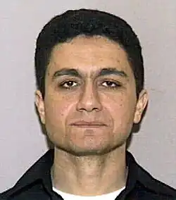 headshot, expressionless, full face of man