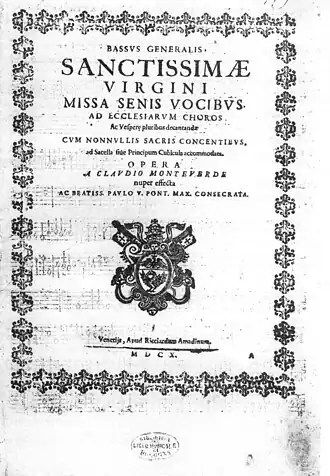 Black & white cover page of printed music, with a decorative ornament as a frame and letters styled in different size