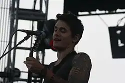 John Clayton Mayor playing the guitar, on stage, at the Mile High Music Festival in 2008