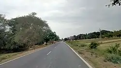 National Highway 227 passing through the village of Basuki Bihari South
