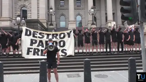 An image of neo-Nazi's performing Nazi salutes during the anti-trans protest on 18 March 2023