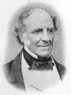 Black-and-white photographic portrait of Dr. Neil Arnott