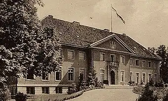 black-and-white photo of manor house