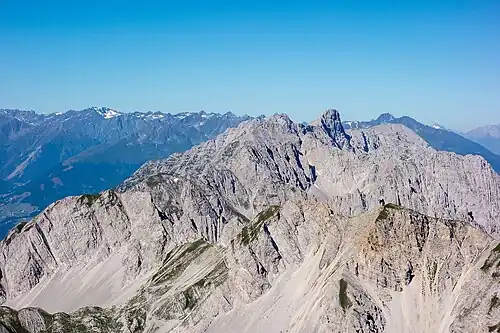 View of the Nordkette from the Stempeljochspitze. The Kleiner Solstein can be seen rising prominently