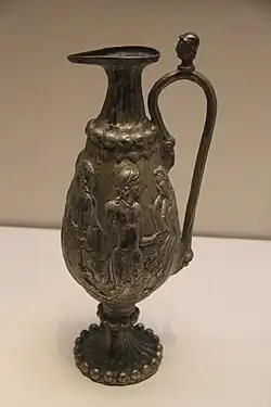 Northern Zhou gilded silver ewer in Greco-Roman style from the tomb of Li Xian.[13]