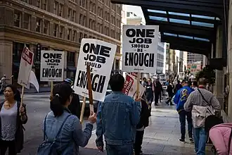 Workers of the Palace Hotel - part of Marriott Hotels - are on strike on October 2018 in San Francisco to fight for higher wages, workplace security and job safety. The hotel strikers are carrying signs which say "One job should be enough".