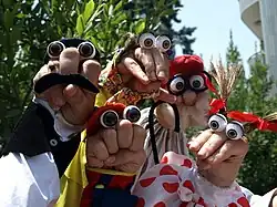 Five bare-hand Oobi puppets with acrylic eyes and fabric costumes