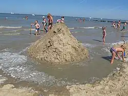 The sea moving in to surround the castle
