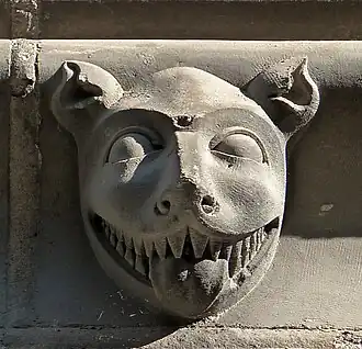 Romanesque mascaron of the Église de la Trinité d'Angers, Angers, France, unknown architect or sculptor, c.1150-1175[27]