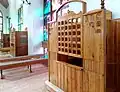 Three wooden confessionals in a row in a Roman Catholic church, Zakopane, Poland