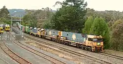 Pacific National freight train passing through Belair