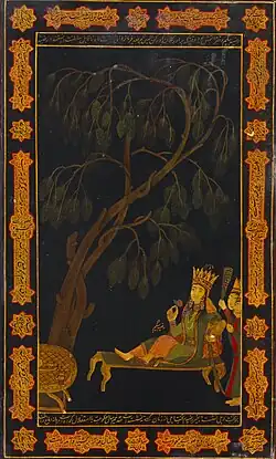 Color photograph of a miniature painting. The painting depicts a royal woman seated on a chair under a tree being attended upon by two woman, with Perso-Arabic calligraphy in the border margins.