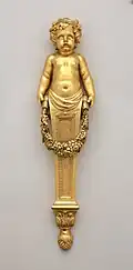 Caryatid putto; 18th century; gilt bronze; 35.2 × 8.9 × 4.5 cm; Metropolitan Museum of Art