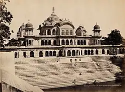 Samuel Bourne, "Palace & Tank. Built by Rajah Bulman Singh. Goverdhun 1311]," 1863–1869, photograph mounted on cardboard sheet