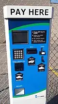 Example of a machine which accepts not only coins, but bills, credit, debit and prepaid cards.