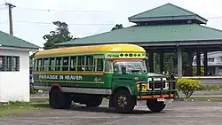 A bus at the Salelologa market