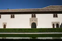 One of the lateral façades of the courtyard, looking east