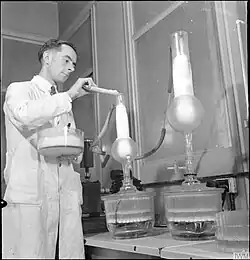 A technician preparing penicillin in 1943.