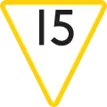 Image of a triangular sign with a yellow border and "15" written in large black text