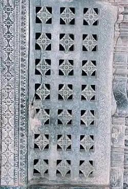 A pierced window screen brings light into the mandapa at Manikesvara Temple in Lakkundi, Lakkundi
