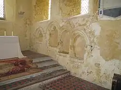 Thirteenth-century Early English piscina and sedilia, St. Mary's, North Stoke, West Sussex
