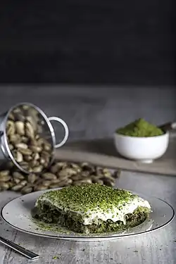 Knafeh coated with pistachio and cream