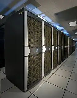 Close up view of one row of compute cabinets that made up the original Harpertown-based system