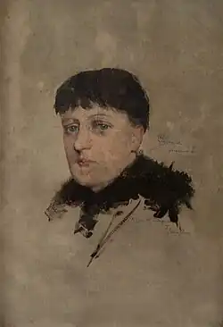 Portrait of Olga Björkegren with just the canvas as a background.