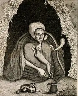 A black and white engraving of a woman kneeling on the ground with a cloak over her shoulders. A dog is jumping up to lick her face, and she is smoking a pipe. Another dog and a cup sit in front of her.