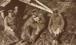 Prince Eitel Friedrich on the far left telephoning from a trench on the field of north Poland 1915