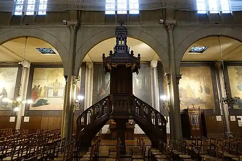 Pulpit with side aisles and murals
