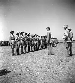 French general Charles de Gaulle visiting Camp Qastina in 1941