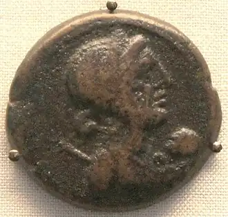 A coin depicting Cleopatra VII with her son Caesarion as an infant, British museum.[29]
