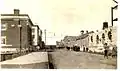 East down 11th Avenue from Scarth Street, 1906. On the right is the Post Office under construction