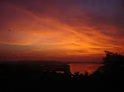 View of Ponte Conde de Linhares along the Mandovi River at dusk