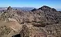 Looking north from the summit to line parent Peak 9860 on left, and Raymond Peak on the right.
