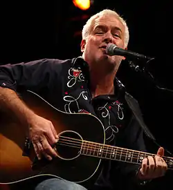 Rutherford performing at the CMA Songwriters' Series on September 3, 2014.