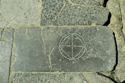 Roman board game engraved on the ground at entrance to Roman Amphitheater