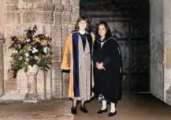 Ros Morpeth and Helen Lentell stand outside Ely Cathedral at Morpeth's degree ceremony where she was awarded an Honorary Doctorate for her contribution to distance learning in 1994.